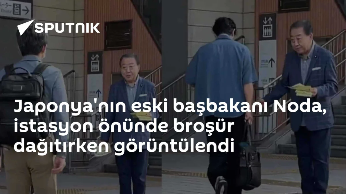 Japonya'nın eski başbakanı Noda, istasyon önünde broşür dağıtırken görüntülendi