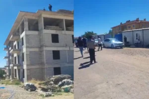 Ücretlerini alamayan işçiler çatıya çıktı